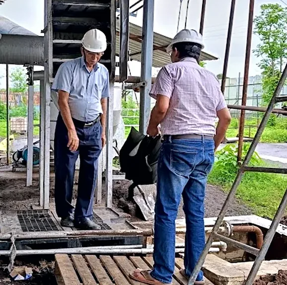Engineers inspecting the Pureva installation